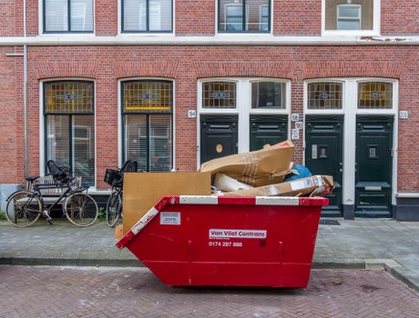 Business professionals discussing waste removal strategies in Richmond upon Thames
