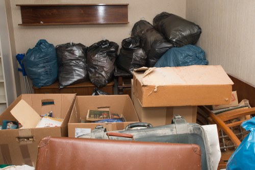 Team from Thames Furniture Removals clearing a home